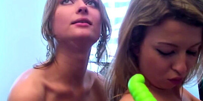 Lesbian friends have fun with toys and whipped cream