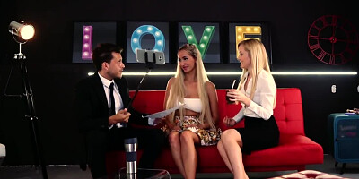 Blonde uses selfie stick during threesome on the red couch