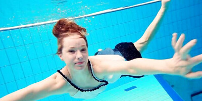 Underwater Show featuring girl's swimming dirt