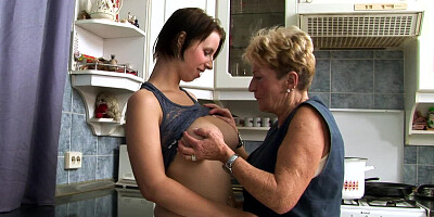Granny plays with a hot thing that has huge natural tits