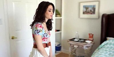 Sensual brunette fingering herself on the couch