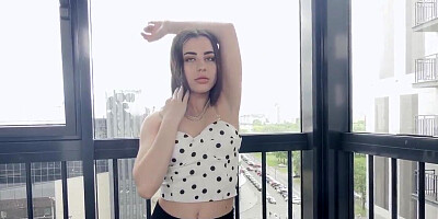 Angelic babe playing with a sex toy on the couch