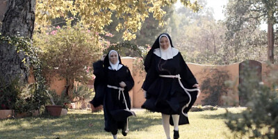 Lesbian nuns get freaky with each other outdoors