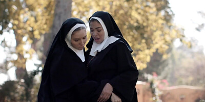 Lesbian nuns get freaky with each other outdoors