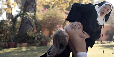 Lesbian nuns get freaky with each other outdoors