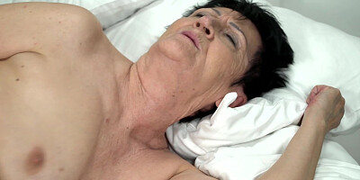 Nasty old granny is being fucked in her pussy really hard