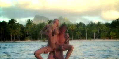 Horny couple is having hot genital interaction in the sea
