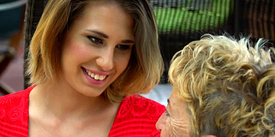 A granny licks a sexy teen with a plus sized body on the bed