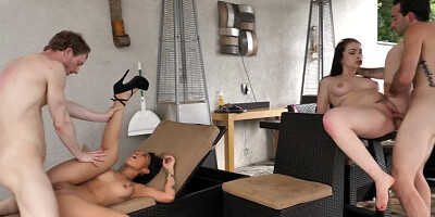 Four horny people are in the middle of passionate fucking