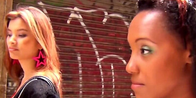 A guy is trying to convince two girls to have sex with them