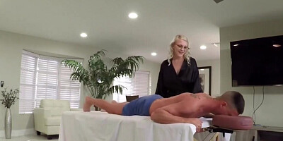 Masseuse with glasses and juicy tits fucked by client