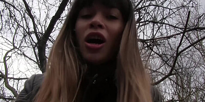 A lovely amateur is spreading her legs in the forest for her partner