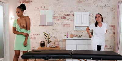 Inappropriate massage for an ebony girl by a cute brunette