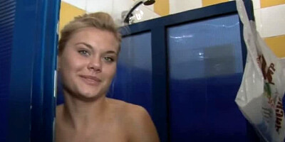 Perfect little slut is naked in the sauna, licking a large dick