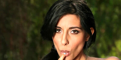 Hot raven haired girl is teasing her wet cunt lips with her hand