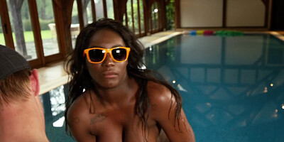 Busty black bitch in shades worships huge cock of skinny stallion