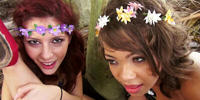 Three ladies get naked and kiss cock in the forest really well