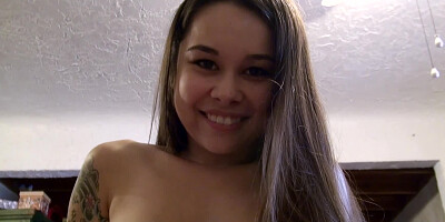 A smiling honey is giving a sensual and sexy kiss to a pecker