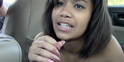 Blowjob by amateur black-skinned teen in the spacious car