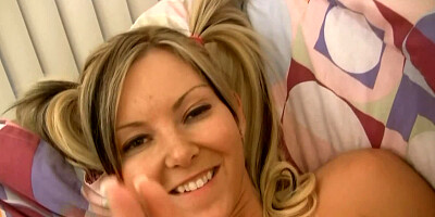 Blonde lady that has small tits is pushing her fingers inside her wet cunt