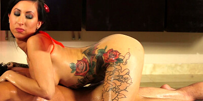 Inked girl Lily Lane massages Tommy Gunn and rides his cock