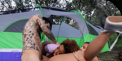 Tattooed stud copulates with two insatiable chicks during camping