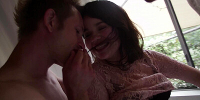 A brunette with a fine ass is getting touched by two large men