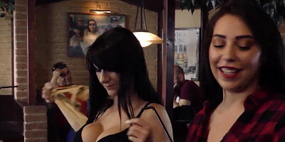 A couple of dykes licking after playing a card game