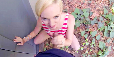 Blonde is sucking a dick in the garden and getting naked