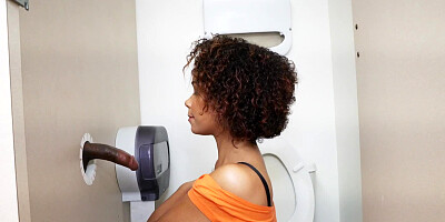 Curly ebony amateur is presented with a big cock to play with