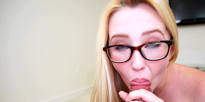 Amateur blonde is getting a hot load of man juices on her glasses