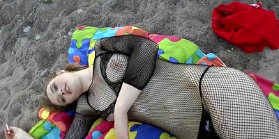 Girl in fishnets blowing