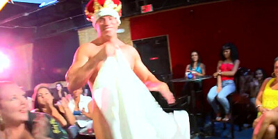 A stripper that has an athletic body gets naked for some ladies