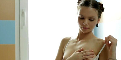 Matilda gets naked and rubs her pussy in the bathroom