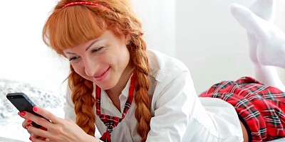 Hot thin redhead is having a threesome with two guys