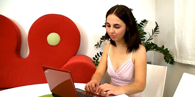 A black haired woman with sensitive nipples is getting cum on her