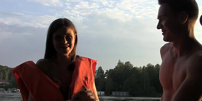 Seductive temptress is giving a blow job on the boat to a guy