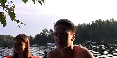 Seductive temptress is giving a blow job on the boat to a guy