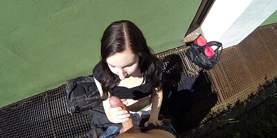 Adorable teen sucks and rides stranger's dick behind house