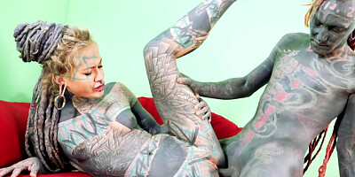 Totally tattooed freak with long dreadlocks fucks his girlfriend