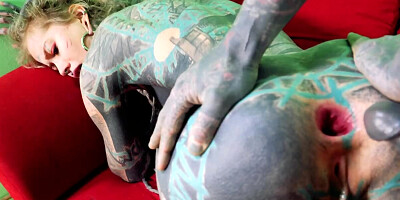 Totally tattooed freak with long dreadlocks fucks his girlfriend