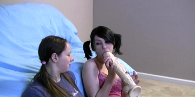 Slutty MILF sucks BF's bulge in front of two curious teens