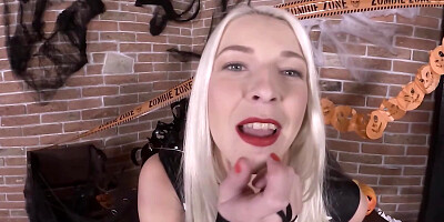 Blonde girl in skeleton costume fingers pussy after reveals tits