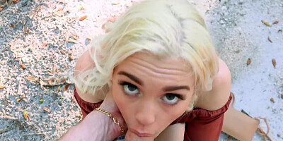Cute blonde is licking and sucking big boner in the open air