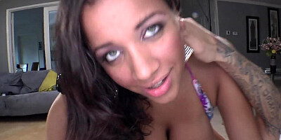 Latina with extra large tits is in the bed with a white guy