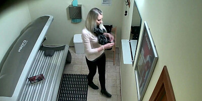 Girl relaxes in solarium not knowing about hidden cams