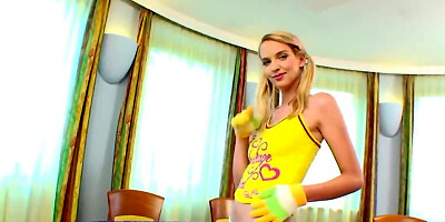 Remarkable blonde girl plays with a glass dildo on the floor