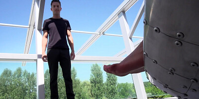 Feet of Liv Revamped turn crazy Alberto Blanco in round chair