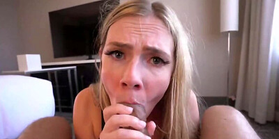 Blonde fellatrix in black stockings gives a blowjob on the camera