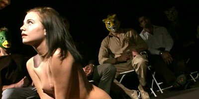 Cute brunette sucks a cock and fucks in front of the crowd